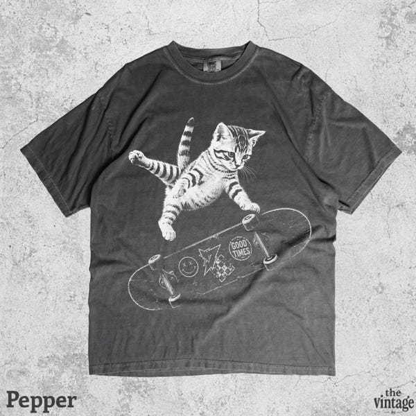 Vintage Retro Skateboarding Cat Graphic Tee vintage graphic tee by TheVintageBy